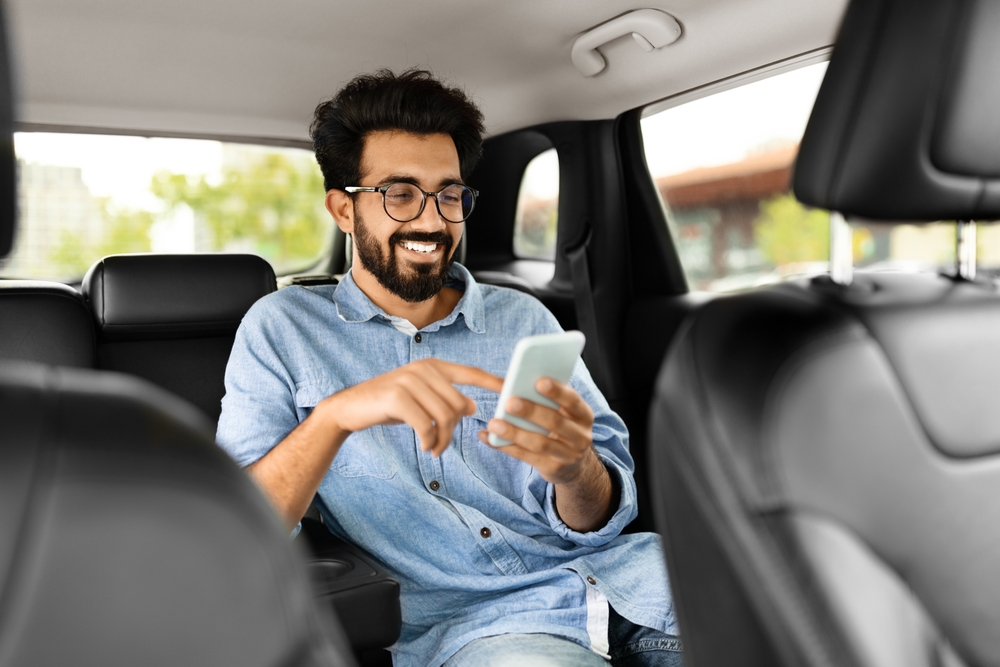 Cheerful,Handsome,Millennial,Indian,Guy,In,Casual,Wearing,Eyeglasses,Sitting